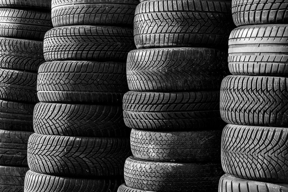 Stack of winter tires ready for seasonal storage
